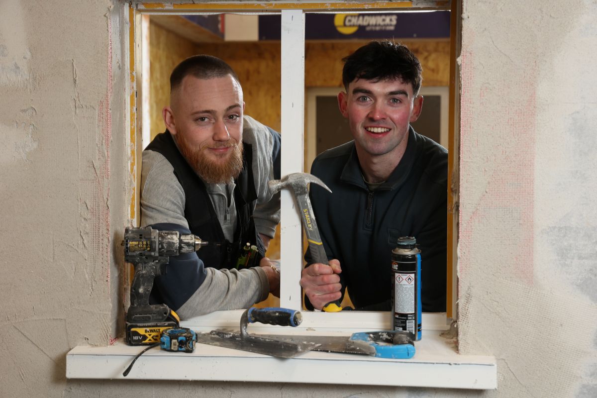 Home improvement YouTube episode featuring two hosts discussing stud walls versus solid walls